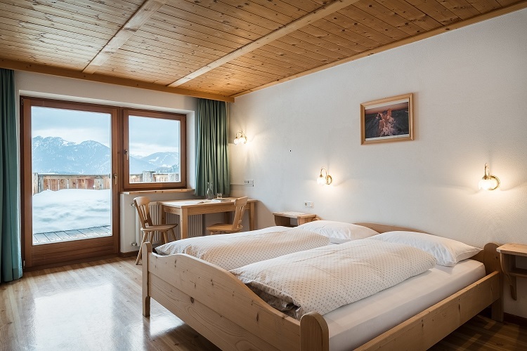 Mountain-style wooden Armentara room Mountain Lodge Ciurnadù La Val